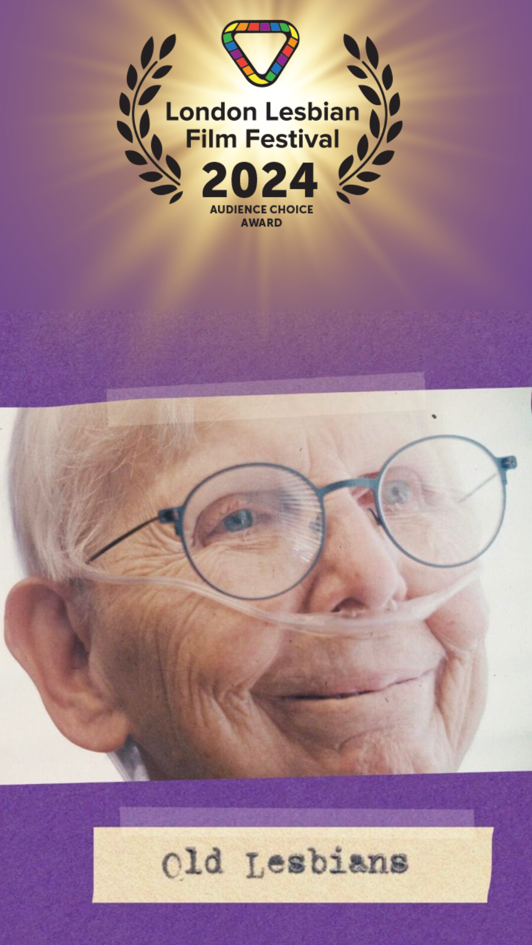 An image of the movie poster for Old Lesbians. A smiling older woman with oxygen tube running to her nose.
